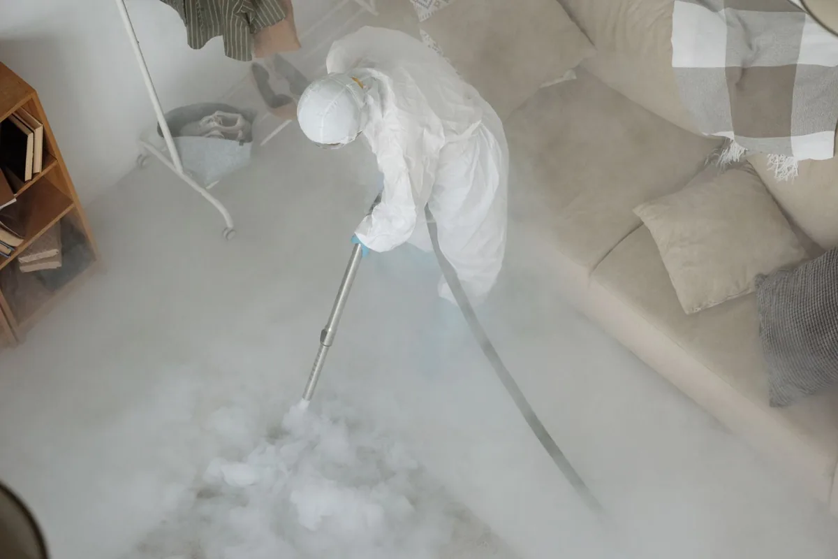 Biohazard cleanup technician in protective equipment, Springfield, MN